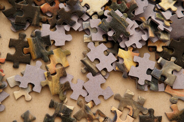 jigsaw puzzle pieces randomly scattered