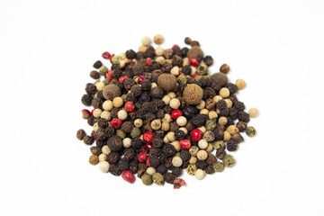 Mix of peppers on a white background. Peppers mix isolated. Peppercorns
