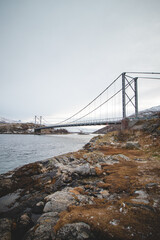 Road bridge in northern Norway on the Senja peninsula on the way from the village of Hamn to the Midlands. Autumn weather in Scandinavia