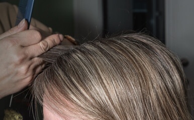 process of cutting and dyeing hair. hair texture. close-up