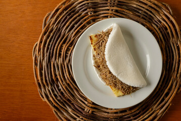 Tapioca  top view. Sun meat tapioca and curd cheese. Typical Brazilian Northeast breakfast.