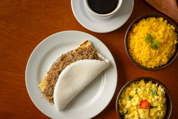 Sun meat tapioca and curd cheese, with eggs and couscous. Typical Brazilian Northeast breakfast.