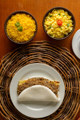 Sun meat tapioca and curd cheese, with eggs and couscous. Typical Brazilian Northeast breakfast.