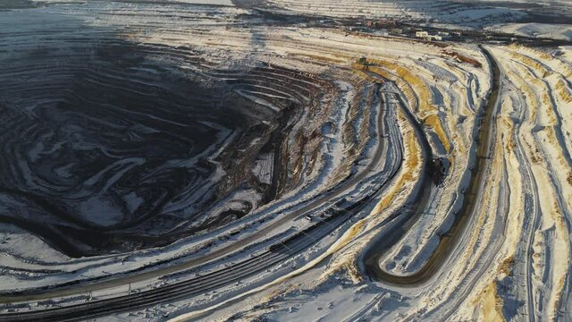huge iron ore quarry iron ore mining aerial video filming drone top view flight over.