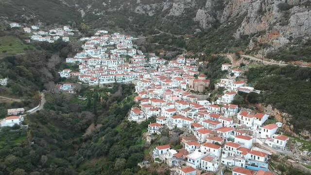 Panoramic view of the Historical Byzantine village Velanidia near cape Malea, Greece. In the Cave above the village is visible the Holy Monastery of Zoodochos Pighi. Laconia Peloponnese, Greece