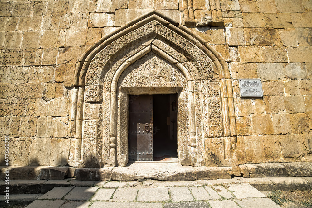 Wall mural Entrance door of Ananuri castle complex on the Aragvi River in Georgia. It was home to Dukes of Aragvi.