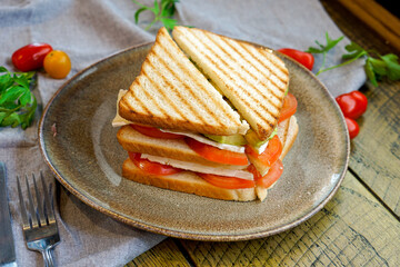 Avocado and brie cheese breakfast sandwich.
