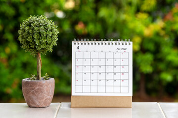 April 2022 Calendar with potted plant