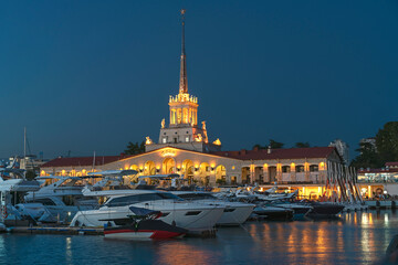 Obraz premium luxury private yachts moored at the pier of the seaport of Sochi, Russia