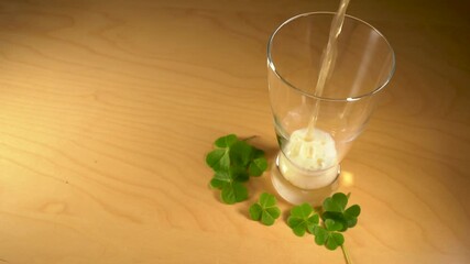 Glass of beer beer glass filling up. St. Patricks day concept