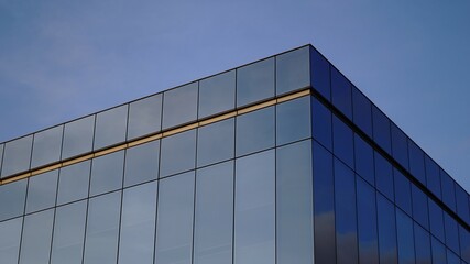 Fototapeta na wymiar sky reflected in glass facade