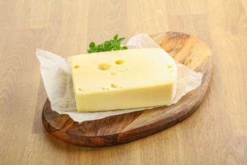 Maasdam cheese over the board