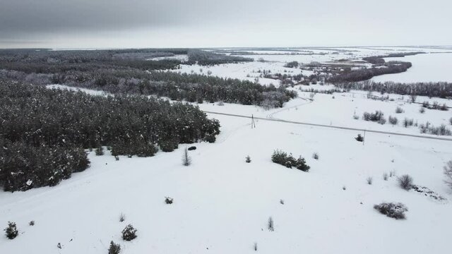 snow - covered fields . snow-covered nature from the air