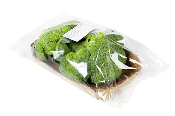 Packaged and labeled broccoli on an isolated white background