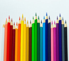 several colored pencils on one sheet