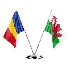 Two table flags isolated on white background 3d illustration, romania and wales