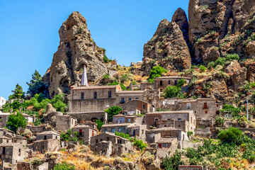 Small village of Pentedattilo, church and ruins of the abandoned village, Greek colony on Mount Calvario, whose form recalls the five fingers. Calabria, Italy