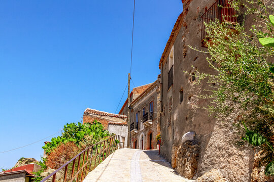 Small village of Pentedattilo, church and ruins of the abandoned village, Greek colony on Mount Calvario, whose form recalls the five fingers. Calabria, Italy