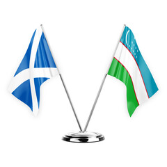 Two table flags isolated on white background 3d illustration, scotland and uzbekistan