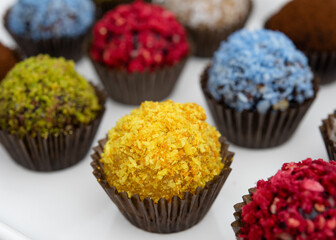 colourful  sweet balls with different tastes on white background	