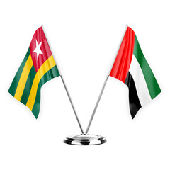 Two table flags isolated on white background 3d illustration, togo and united arab emirates