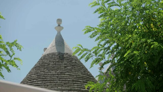 typical trulli of Alberobello surrounded by nature
