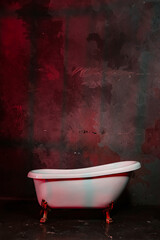 White bathtub against a red bloody wall
