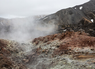  Icelandic highlands geothermal area with steam within   petrified old  lava flow