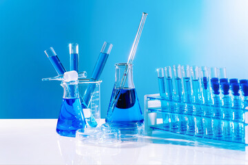 Stand to show glass cosmetic product.Empty flasks in a chemical laboratory.Science laboratory.Scientific experiment.Concept of medicine.Collection of medical flasks.The chemicals in many glass tubes.