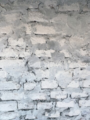 Texture of bricks with cement. Background texture of aged masonry. Rough wall of bricks. Close up. Concept of background for your text.