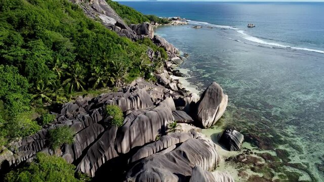 beach with large stones on the island of La Digue
