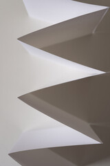 paper background with triangles - light and shadow effect