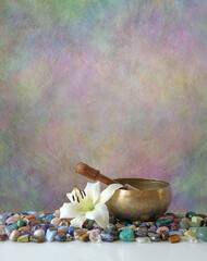 Holistic Shamanic therapy crystal and sound therapy concept background - a rustic stone...