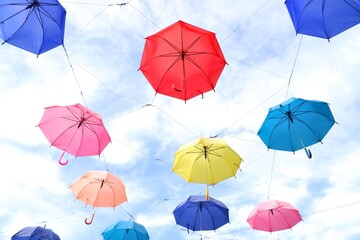 Colorful umbrellas background. Colorful umbrellas in the sky. cafe decoration.