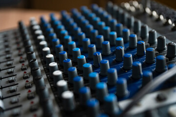 audio devices, sound engineering, mixer, mixing console, knobs and faders on the audio mixer
