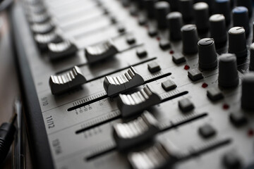 audio devices, sound engineering, mixer, mixing console, knobs and faders on the audio mixer