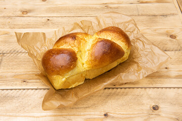 Brioche, made from a paste with eggs, yeast, milk, butter and sugar. The crust is browned before...