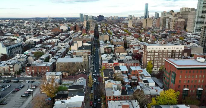 American urban city. Descending aerial of residential district in urban center. Metropolitan USA.