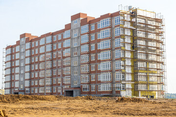 the construction of a residential building is nearing completion, insulation of external walls with subsequent finishing