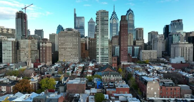 Rising aerial establishing shot of Philadelphia PA skyline. Beautiful cinematic clip establishing shot of urban American city.