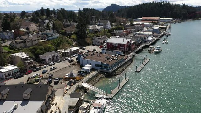 Drone shot of the Swinomish Channel and La Conner downtown waterfront  on a native American indian tribal reservation in Washington