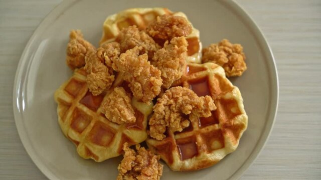 homemade fried chicken waffle with honey or maple syrup