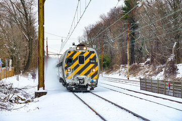 Amtrak  Keystone train approaching Narberth statioon in the cold