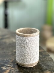 A large drinking glass made of marble