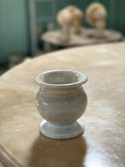 Pots or flower holders and other stem decorations made of marble