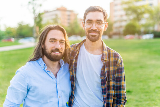 A Happy Gay Couple Looking At Camera Spending Time Together