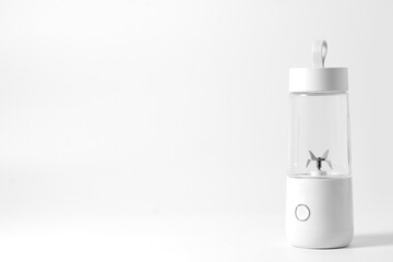 A mini juicer. A useful tools to extract juice from fruits and vegetables on the go.