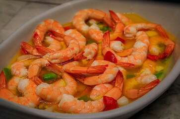 Spanish pintxos of shrimp with peppers in a Basque bar, San Sebastian, Spain