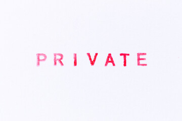 Red color ink rubber stamp in word private on white paper background