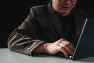 Asian man using computer. Businessman showing emotions during work. Technology of the world in the 5G. Working during the covid19. man working on the internet.
